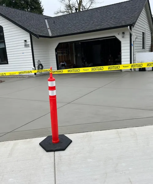 Broom Finish Driveway Replacement With Decorative Borders in Newcastle 